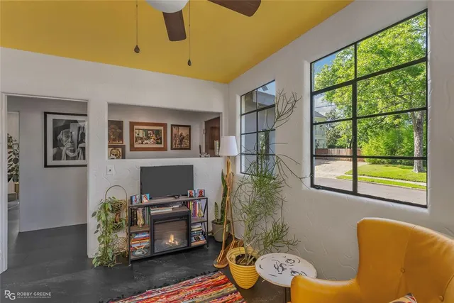 a living room with furniture and a window