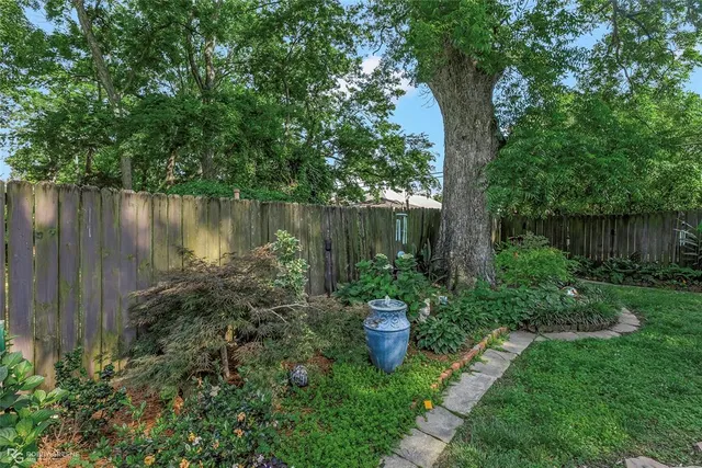 a view of a garden with a lake