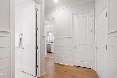 a room with a table and chairs