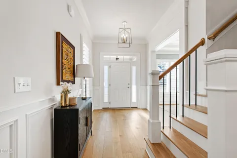 a view of a kitchen and dining room