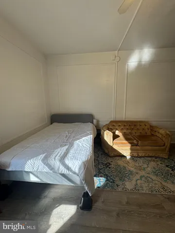 a view of a bathroom with a sink and a mirror