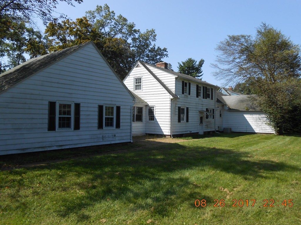 2338 Wilbraham Road Springfield, MA 01129 - Photo 4 of 17 a house view with a garden space