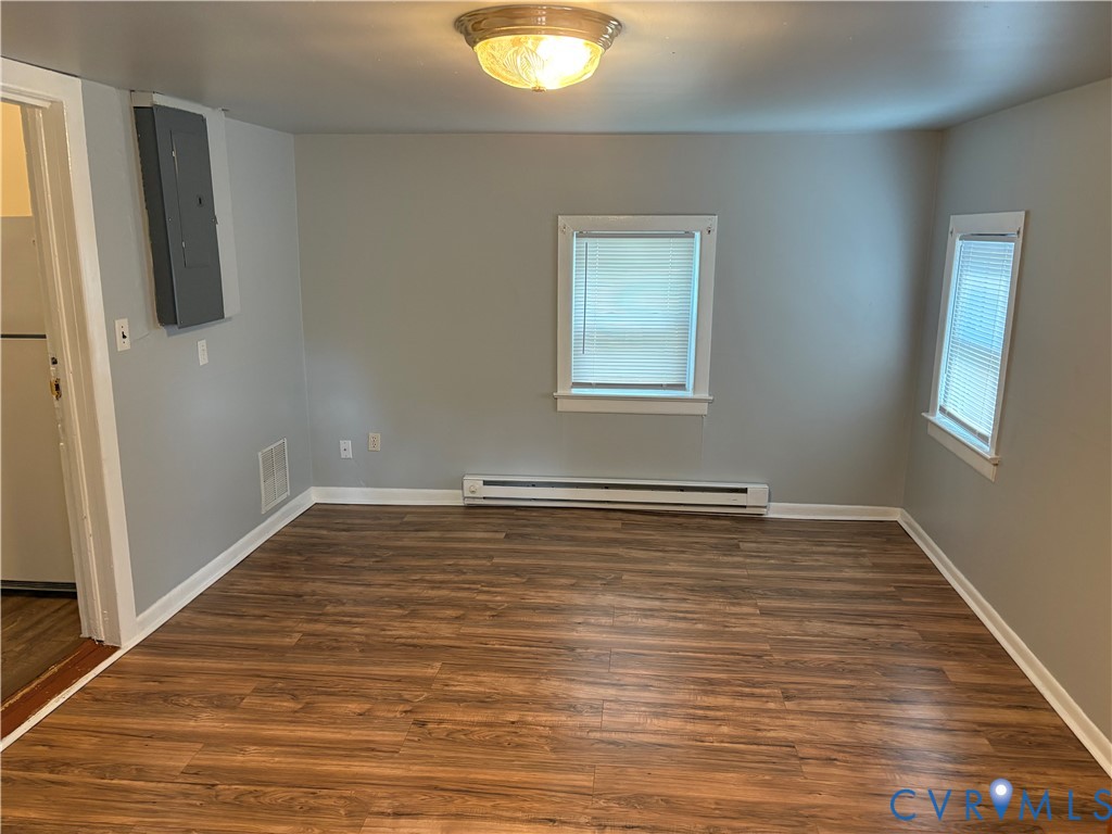 1904 Arlington Road Hopewell, VA 23860 - Photo 8 of 13 Unfurnished room featuring electric panel, dark wo