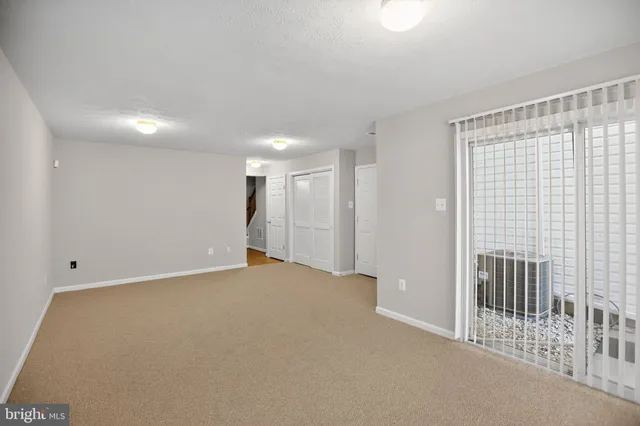 a bathroom with a sink toilet and mirror
