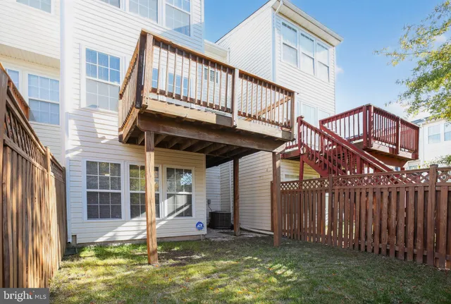 a view of balcony with wooden floor