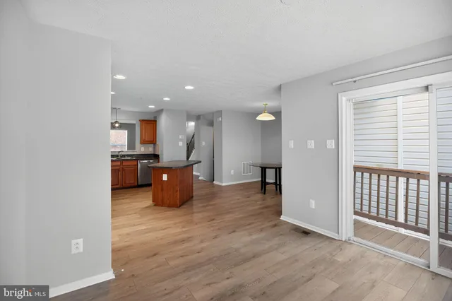 a front view of a house with a small yard