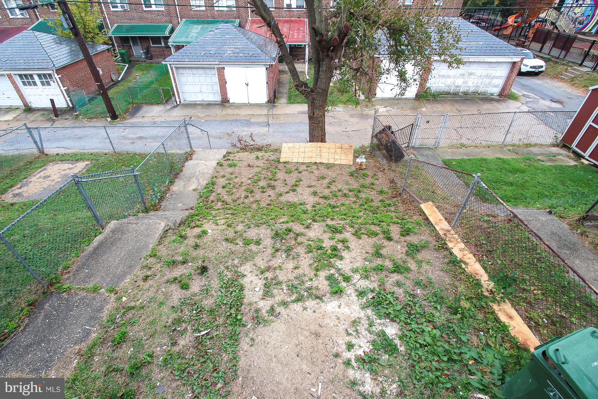 1503 East Cold Spring Lane Baltimore, MD 21218 - Photo 22 of 25 a view of a backyard of the house
