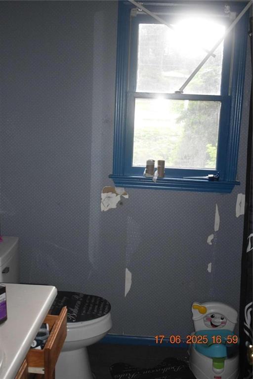 4433 Azalea Drive Macon, GA 31210 - Photo 23 of 24 a bathroom with a sink and toilet