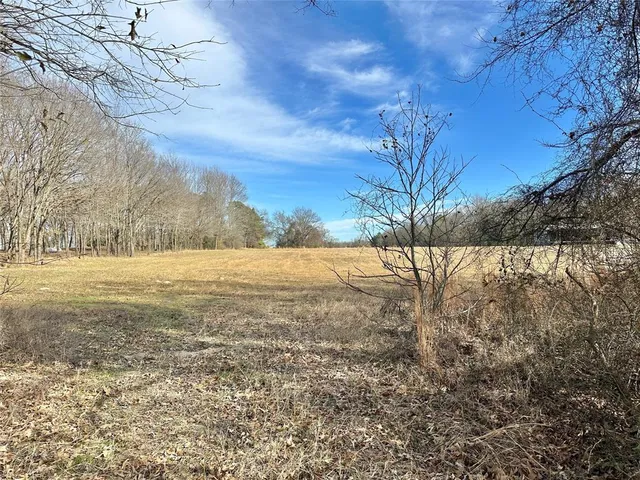 a view of yard covered with snow