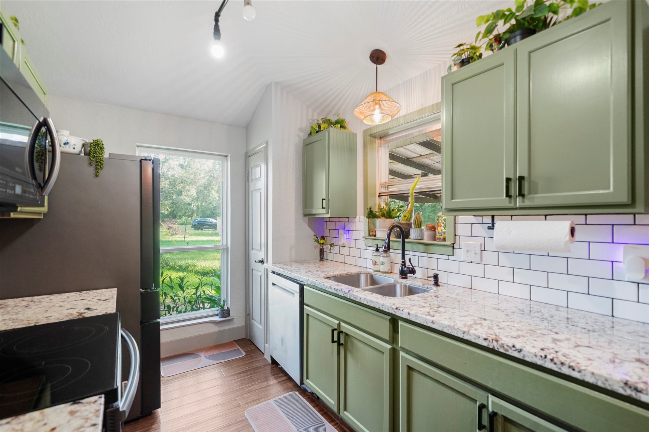 7477 Hidden Acres Drive Cleveland, TX 77328 - Photo 13 of 31 a bathroom with a sink and a mirror