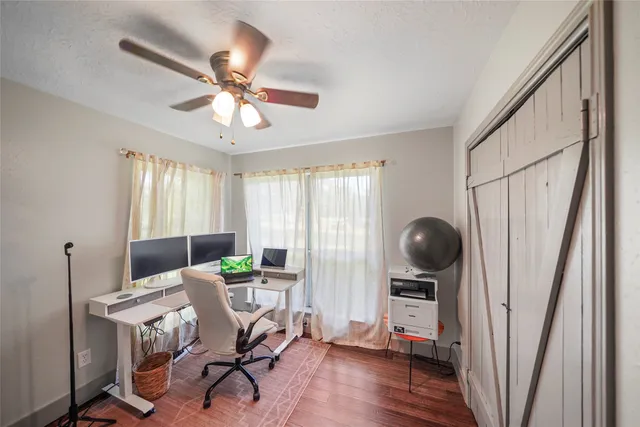 a view of a livingroom with furniture and window