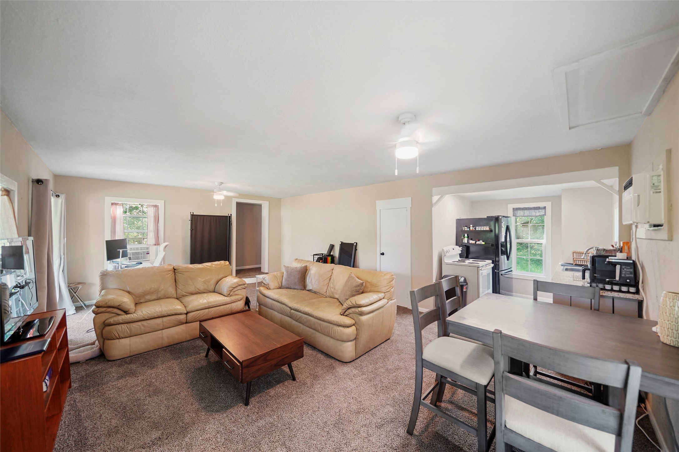 7477 Hidden Acres Drive Cleveland, TX 77328 - Photo 25 of 31 a living room with furniture and wooden floor
