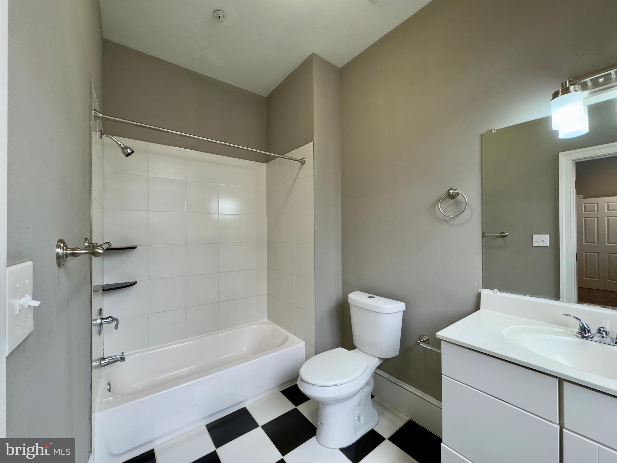 7 West Mulberry Street, Unit 4 Baltimore, MD 21201 - Photo 19 of 19 a bathroom with a sink a toilet and shower