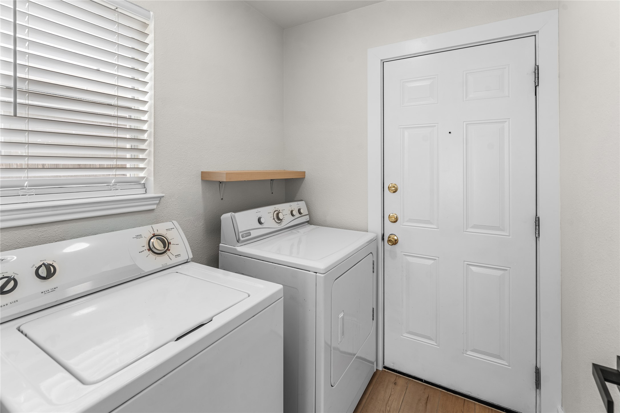 183 Musgrav Kyle, TX 78640 - Photo 24 of 24 a utility room with dryer and washer