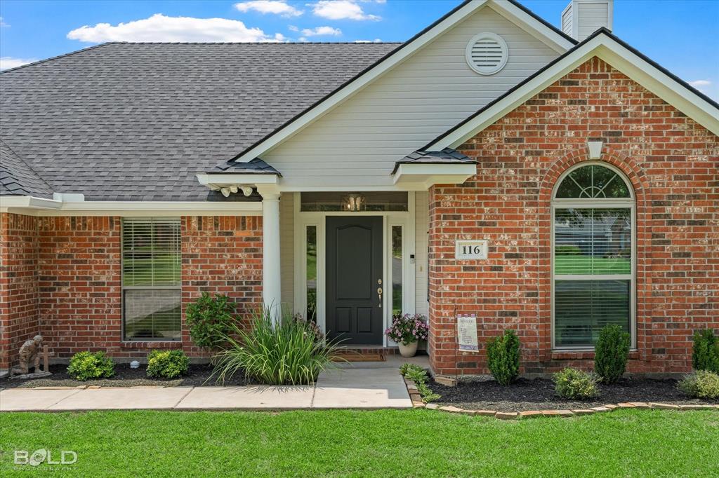 116 Augusta Avenue Benton, LA 71006 - Photo 2 of 38 a front view of a house with a yard