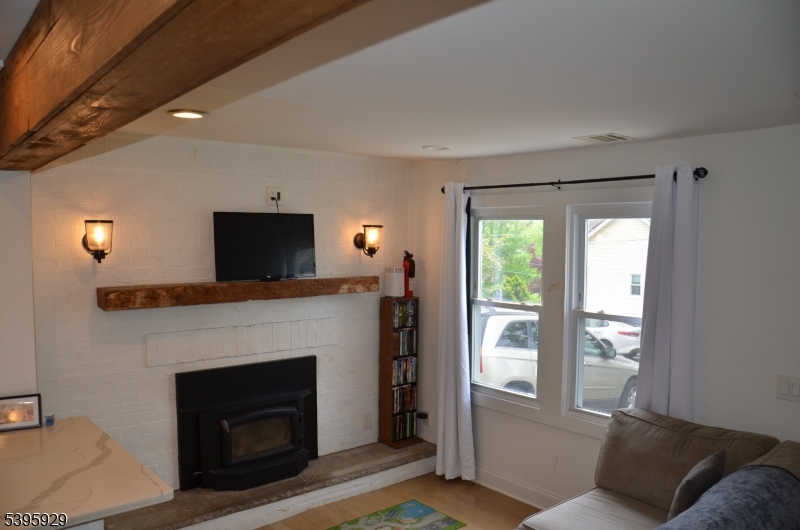 5 West Fairview Avenue Mine Hill, NJ 07803 - Photo 6 of 14 a living room with furniture and a fireplace