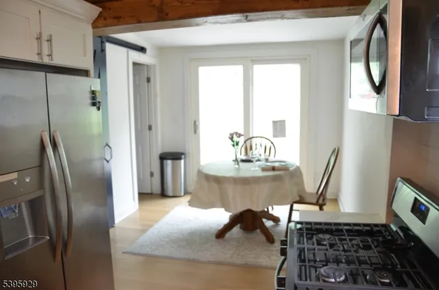 a kitchen with a stove and a microwave