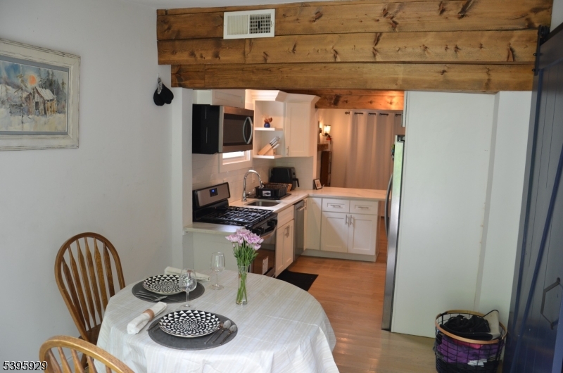 5 West Fairview Avenue Mine Hill, NJ 07803 - Photo 10 of 14 a kitchen with a sink and a stove