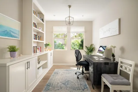 a view of a dining room with furniture window and outside view