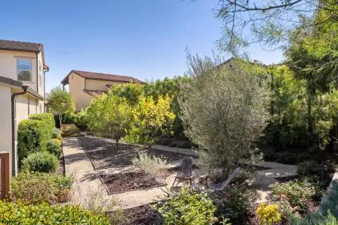 a patio with table and chairs