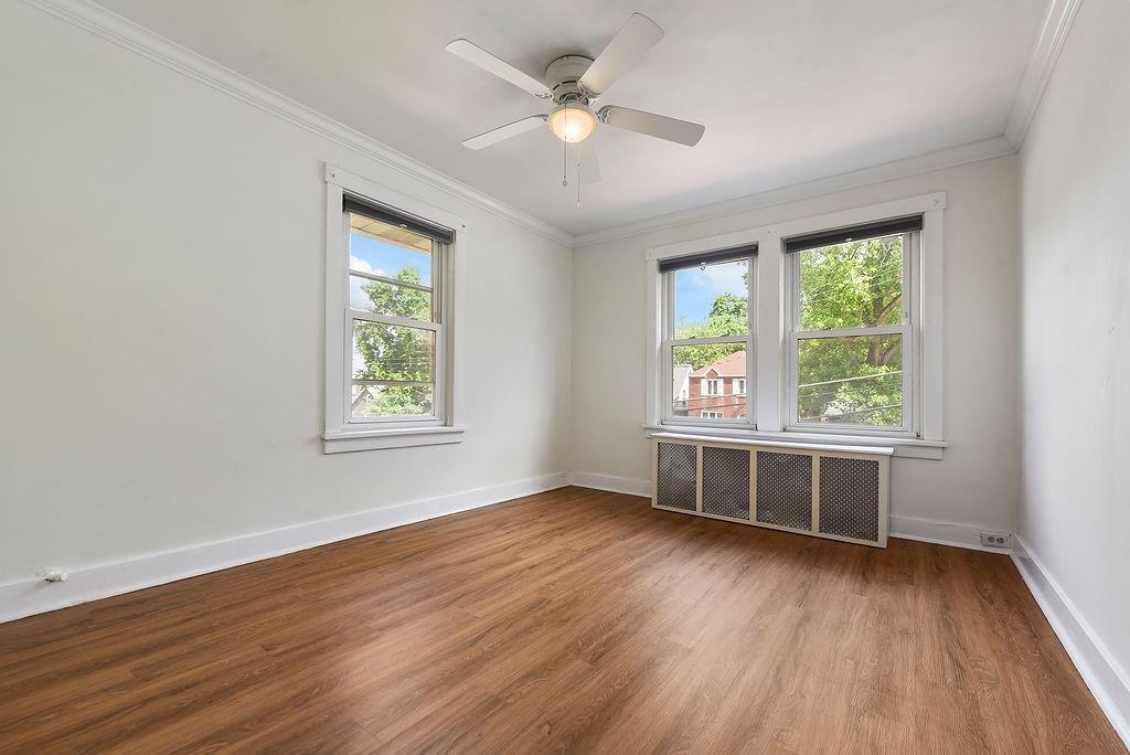 6418 Landview Road Pittsburgh, PA 15217 - Photo 25 of 40 a view of an empty room with wooden floor and a window