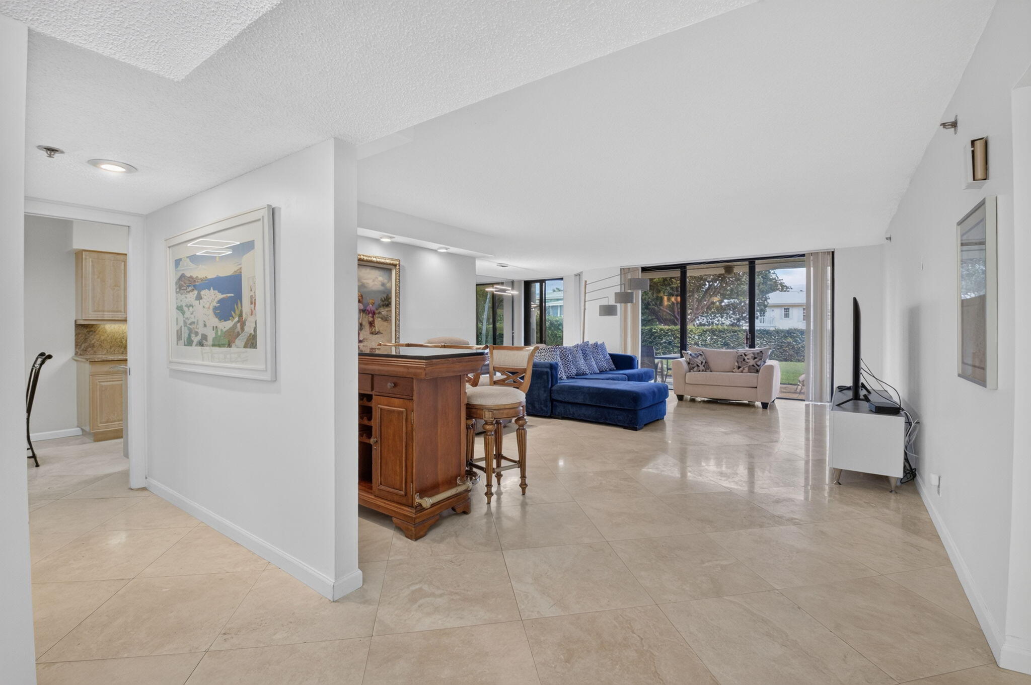 1401 South Ocean Boulevard, Unit 1060 Boca Raton, FL 33432 - Photo 3 of 46 a living room with furniture and a window