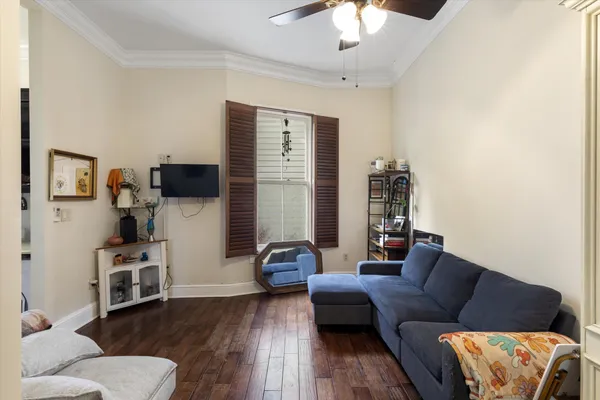 a picture of a bench in front of a white house