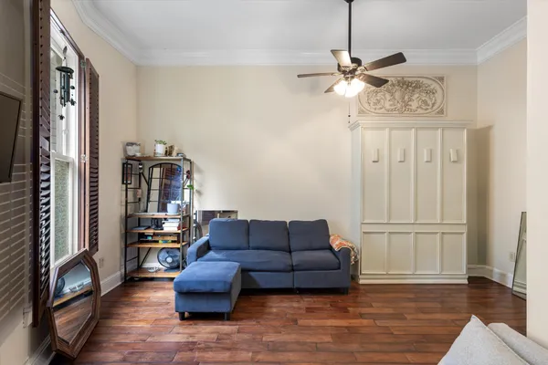 a living room with furniture and a window