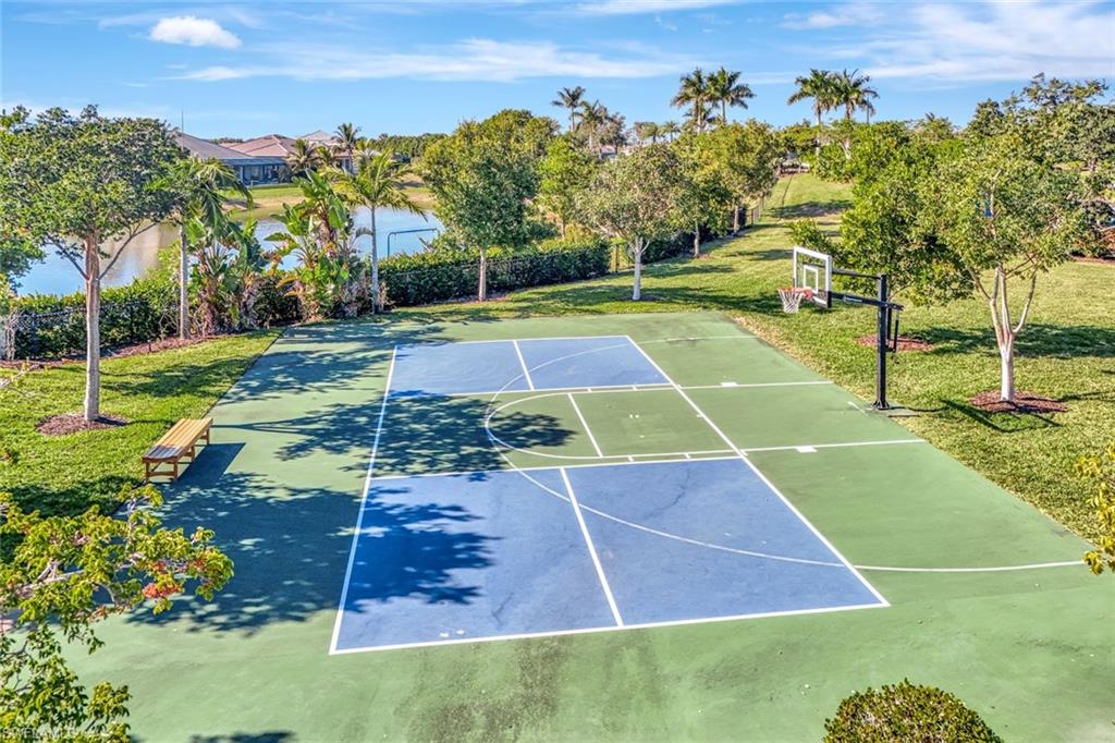 14559 Edgewater Circle Naples, FL 34114 - Photo 41 of 49 a view of a tennis court