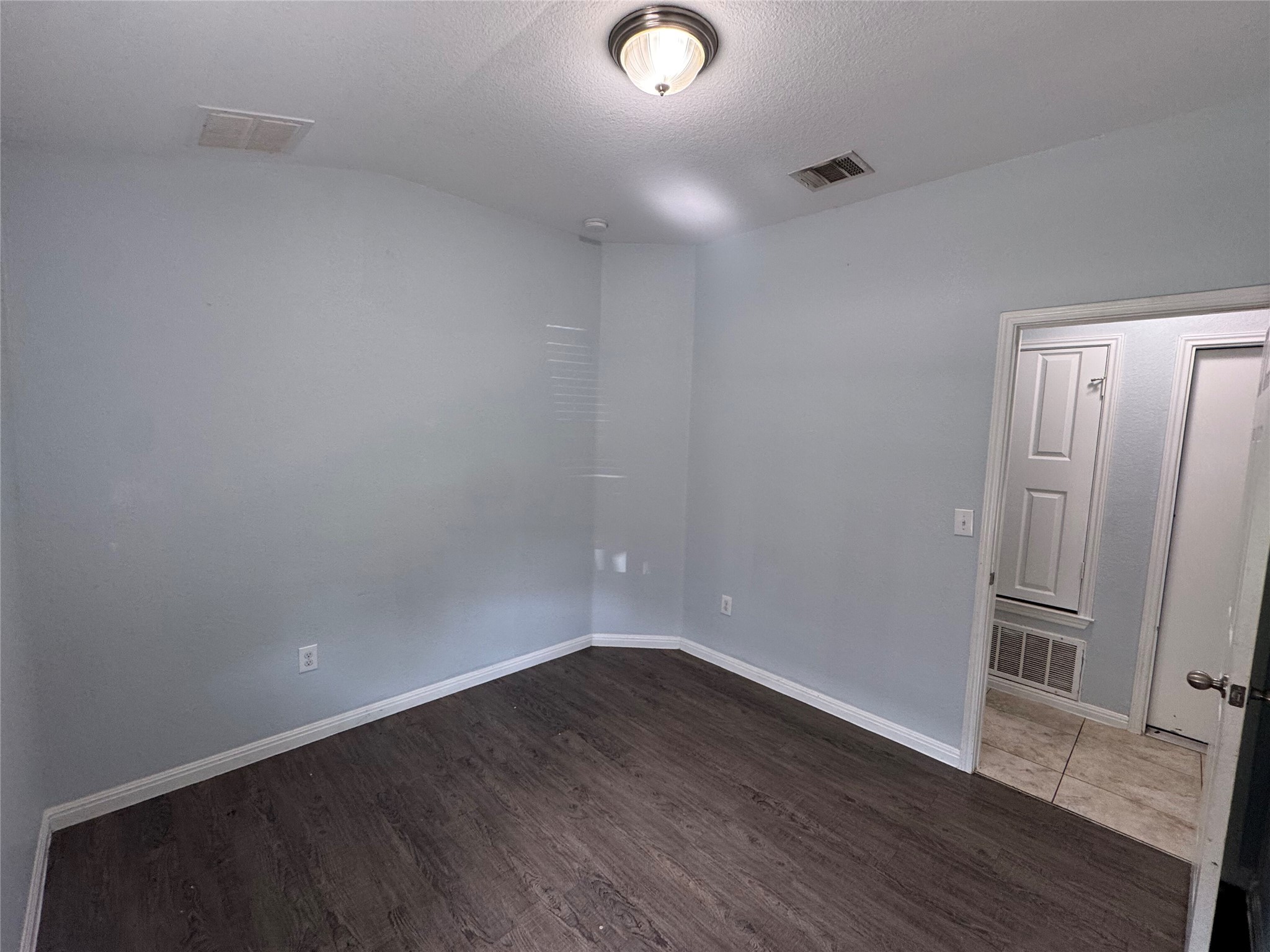 1520 Portchester Castle Path Pflugerville, TX 78660 - Photo 16 of 26 Newly installed wood flooring spans this flexible space, ready for your personalized touch.