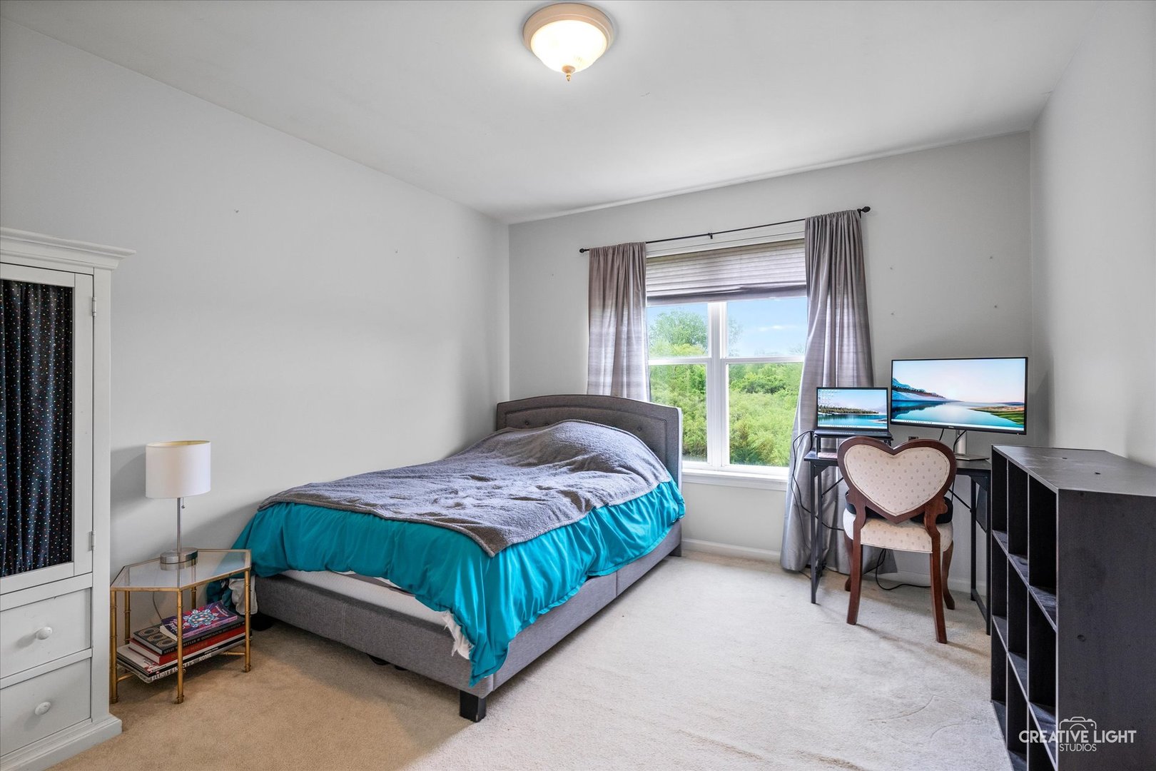 S970 Newton Square Geneva, IL 60134 - Photo 11 of 35 a bedroom with a bed and a desk