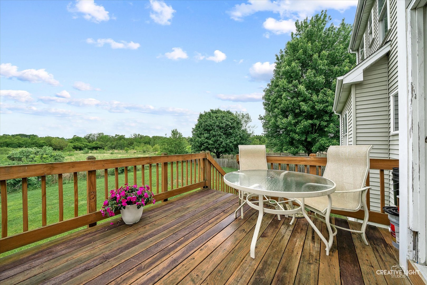 S970 Newton Square Geneva, IL 60134 - Photo 17 of 35 a view of a chairs and table in the balcony