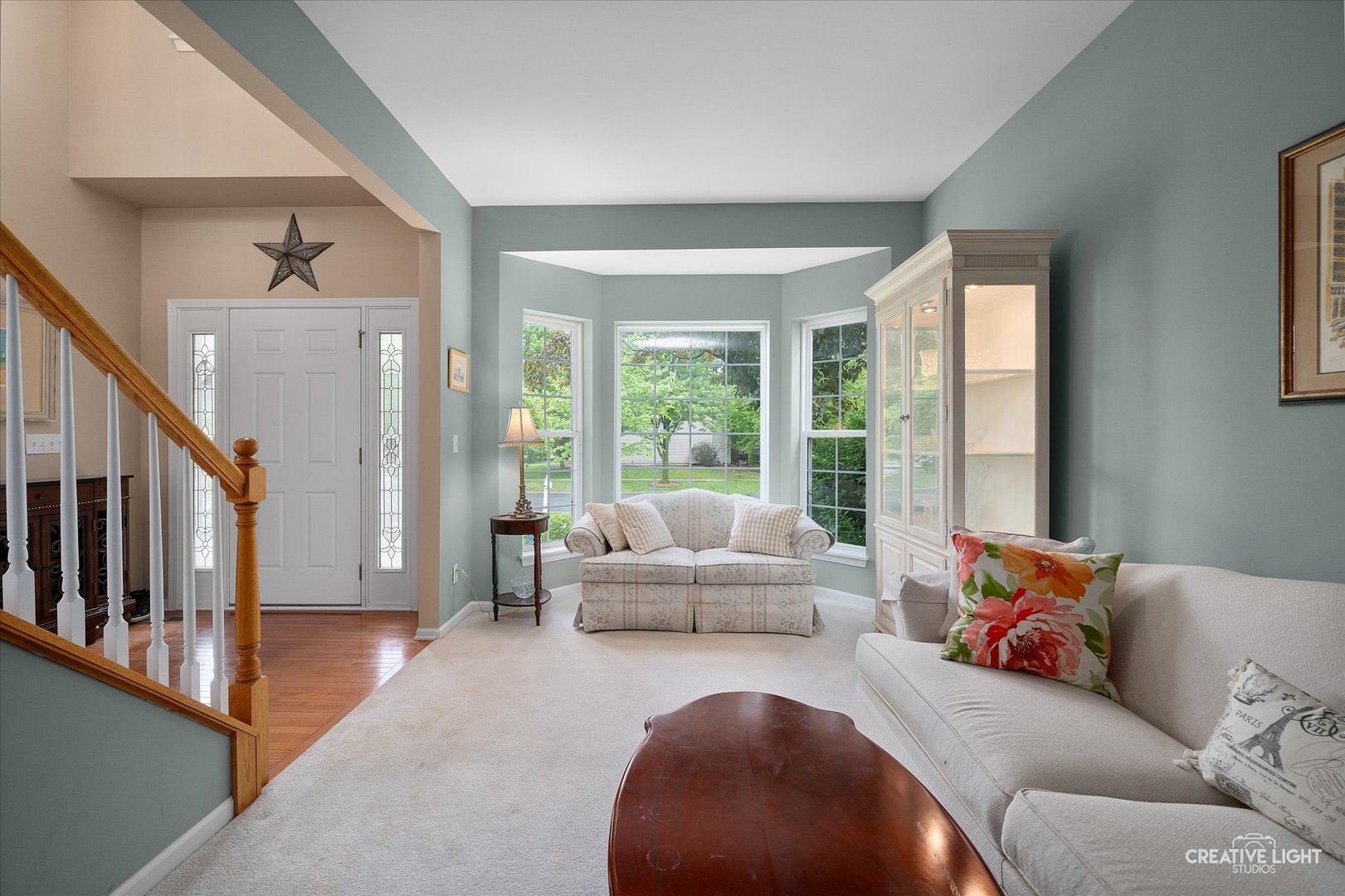 S970 Newton Square Geneva, IL 60134 - Photo 2 of 35 a living room with furniture and a large window