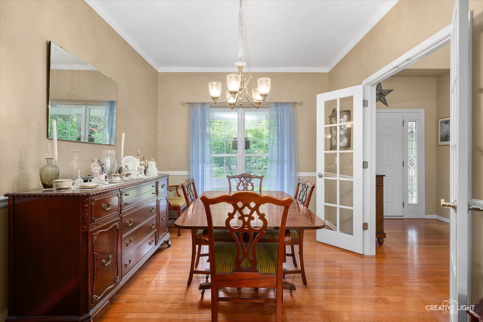 S970 Newton Square Geneva, IL 60134 - Photo 4 of 35 a view of a dining room with furniture window and outside view