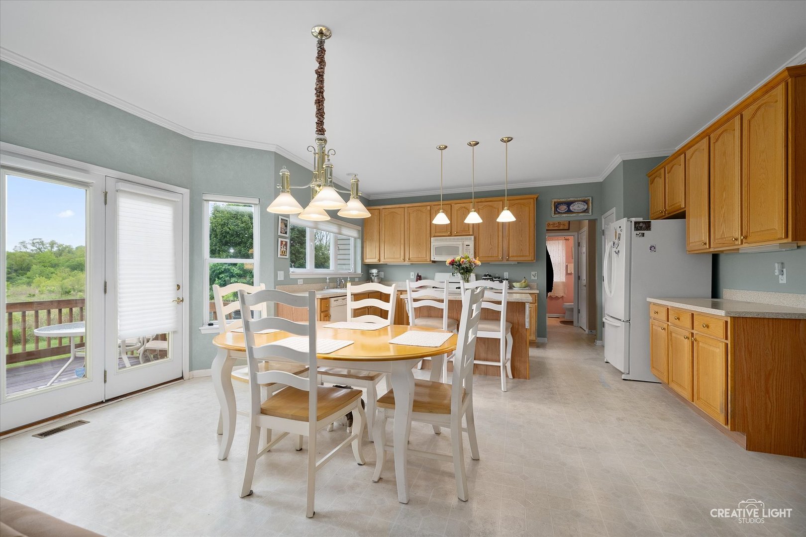 S970 Newton Square Geneva, IL 60134 - Photo 6 of 35 a dining room with furniture and a chandelier