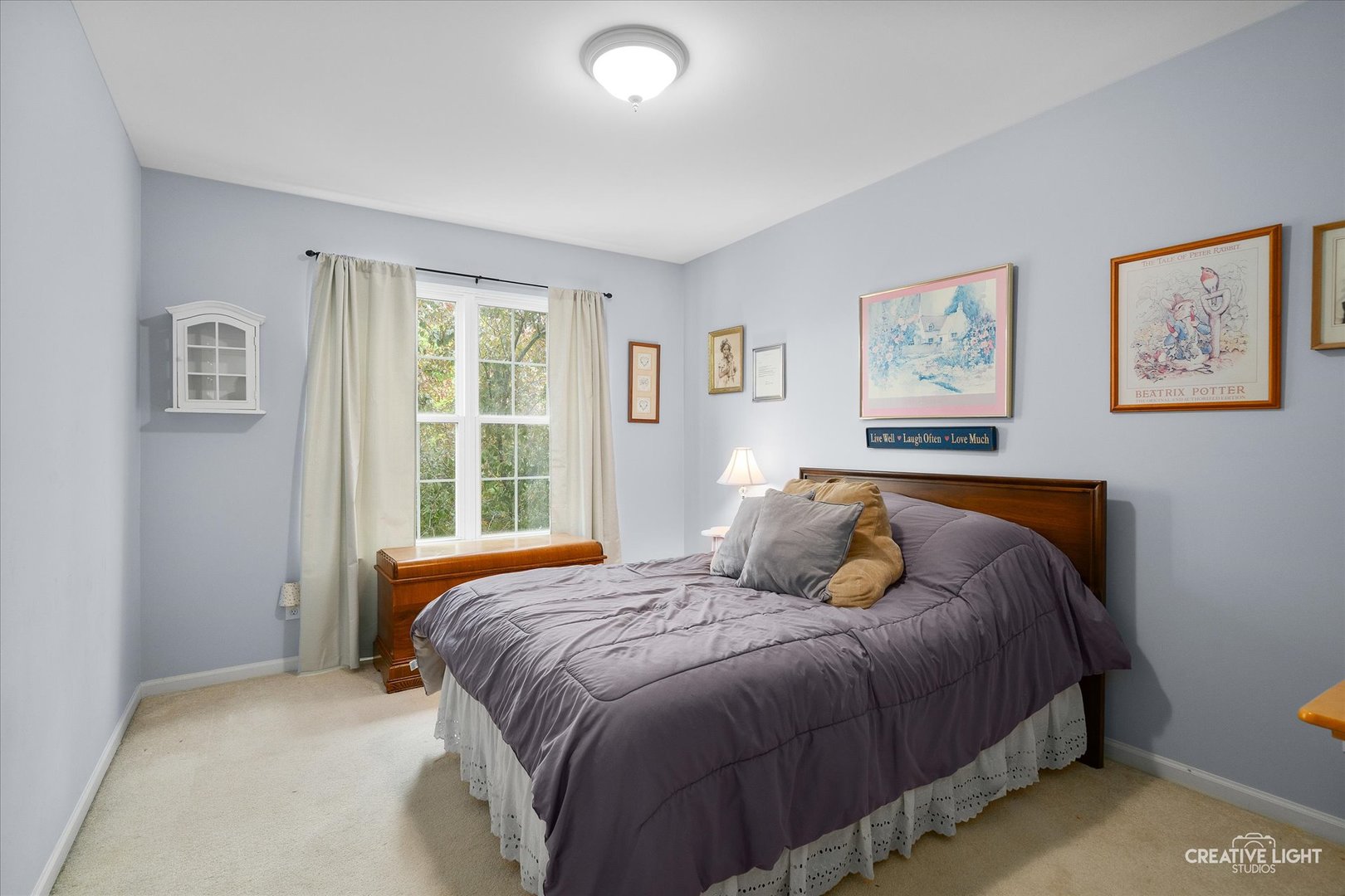 S970 Newton Square Geneva, IL 60134 - Photo 10 of 35 a bedroom with a bed and a window