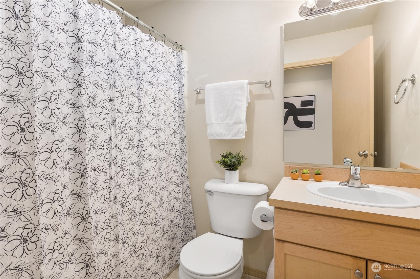 2430 194th Street Southeast Bothell, WA 98012 - Photo 23 of 27 a bathroom with a toilet and a sink