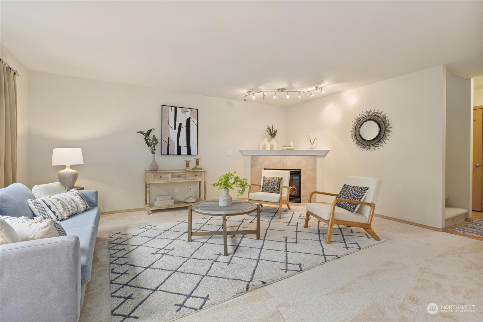 2430 194th Street Southeast Bothell, WA 98012 - Photo 5 of 27 a living room with furniture and a fireplace