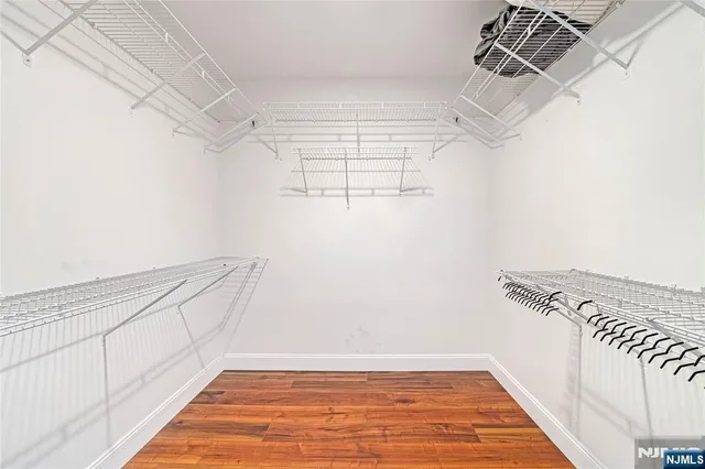 a view of a room with racks on the wall