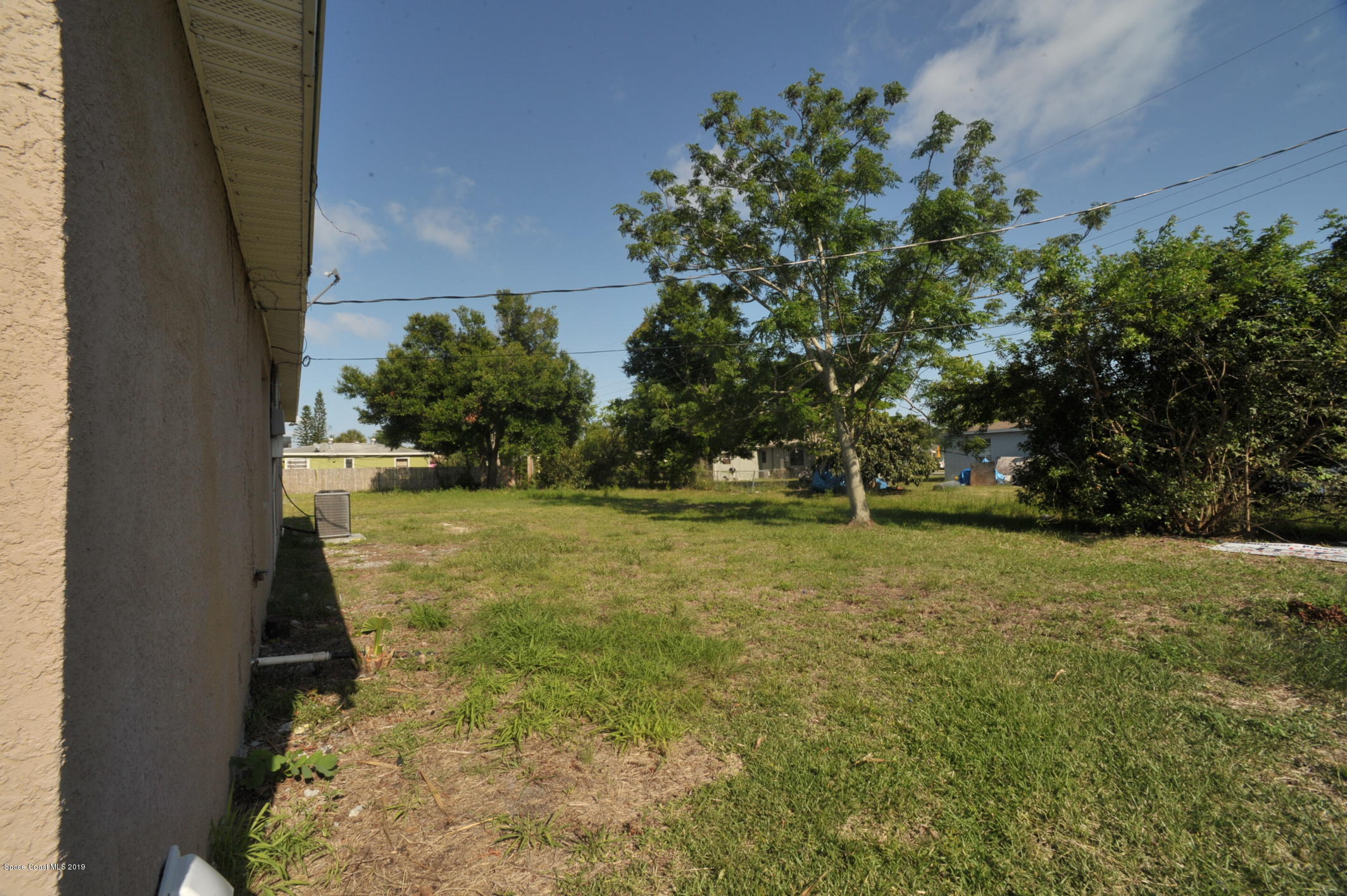 1049 Mitchell Street Cocoa, FL 32922 - Photo 12 of 12 a view of yard with green space