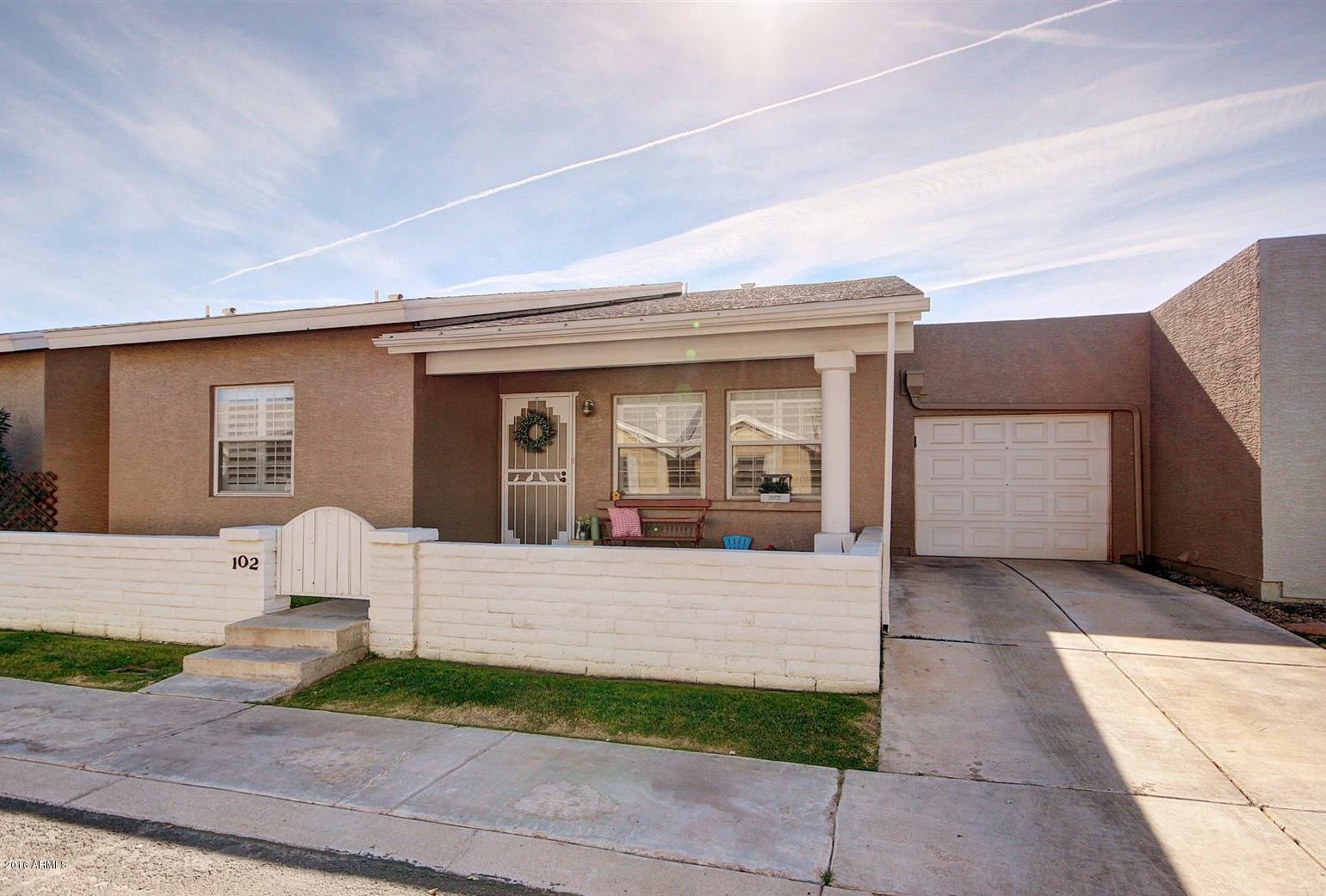 2929 East Broadway Road, Unit 102 Mesa, AZ 85204 - Photo 1 of 16 a view of house and yard