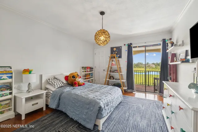 a view of dining room with furniture window and wooden floor