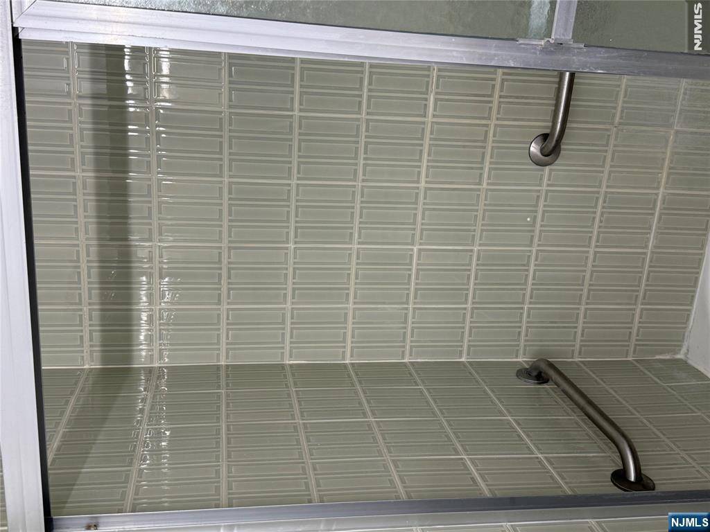280 South Prospect Avenue, Unit 3N Hackensack, NJ 07601 - Photo 13 of 24 a bathroom with a shower