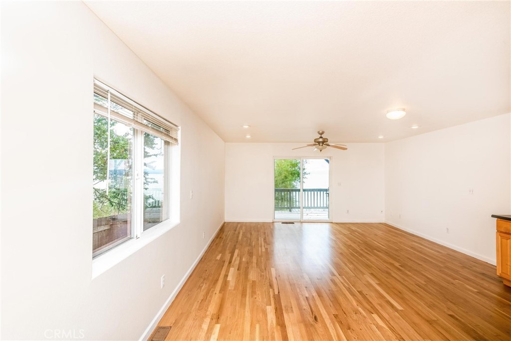 4567 State Highway 20 Nice, CA 95464 - Photo 16 of 58 a view of an empty room with wooden floor and a window