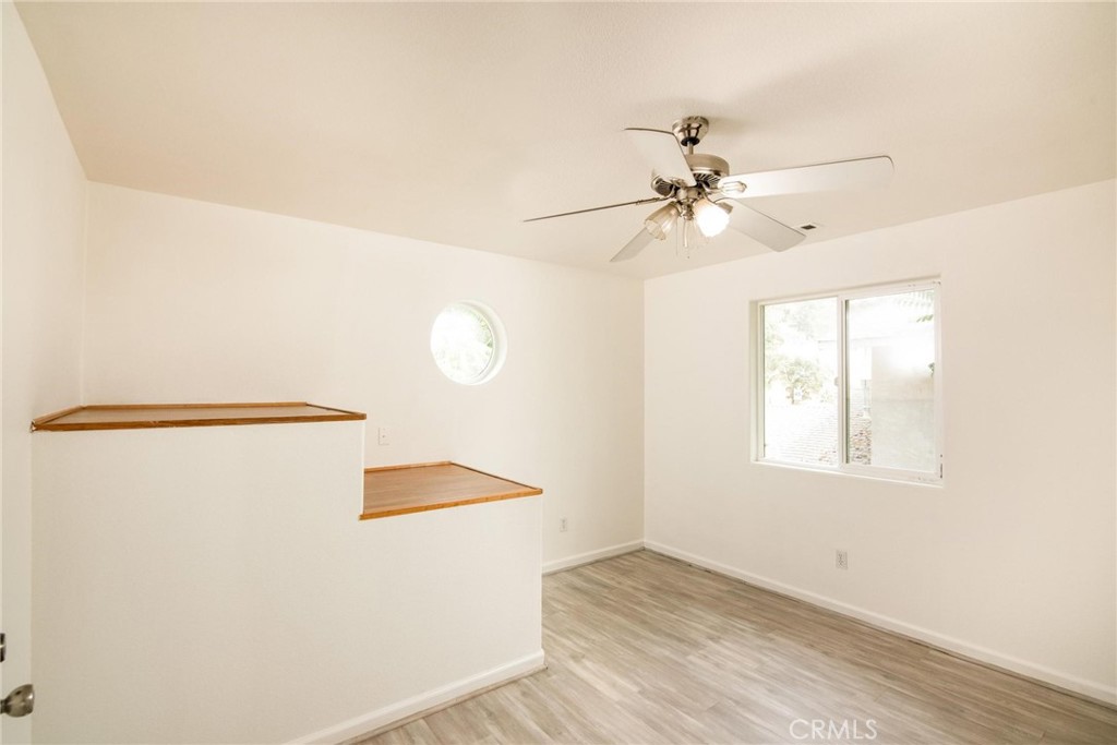 4567 State Highway 20 Nice, CA 95464 - Photo 20 of 58 a view of a room with a ceiling fan and a window