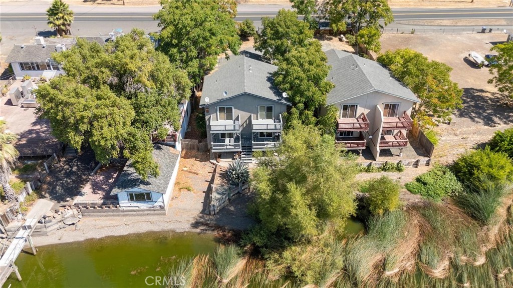 4567 State Highway 20 Nice, CA 95464 - Photo 30 of 58 a aerial view of a house with a yard and potted plants