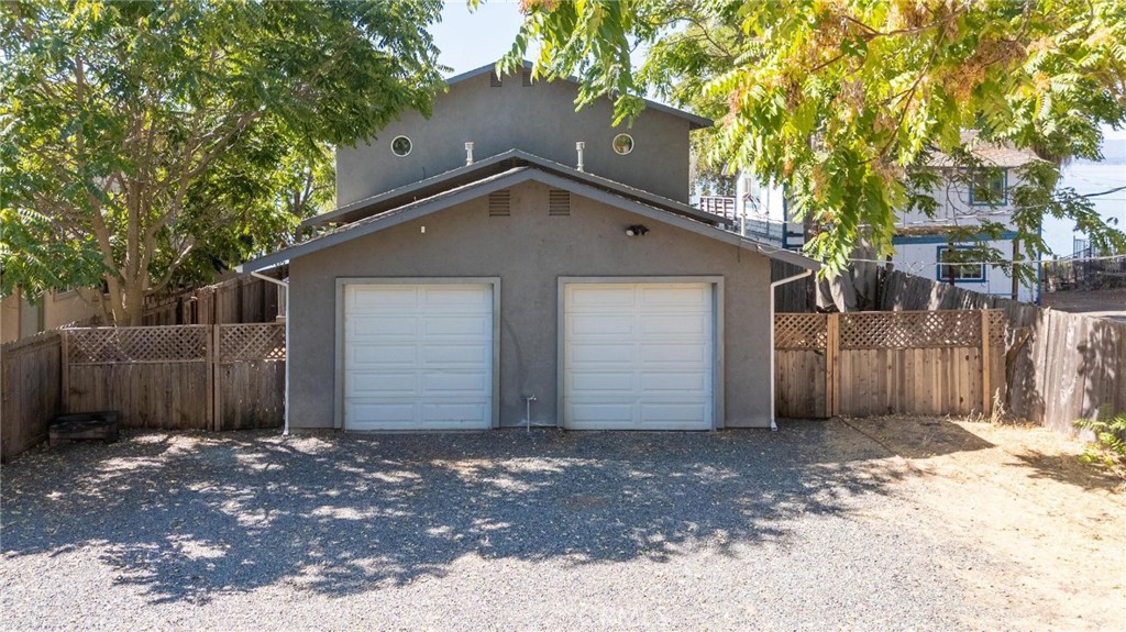 4567 State Highway 20 Nice, CA 95464 - Photo 34 of 58 a front view of a house with a yard