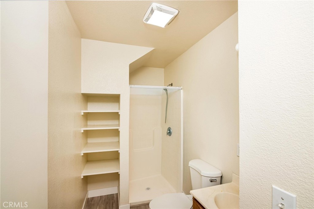 4567 State Highway 20 Nice, CA 95464 - Photo 44 of 58 a bathroom with a toilet and a shower