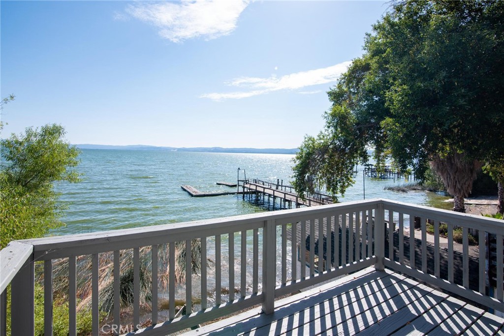 4567 State Highway 20 Nice, CA 95464 - Photo 6 of 58 a balcony with wooden floor and fence