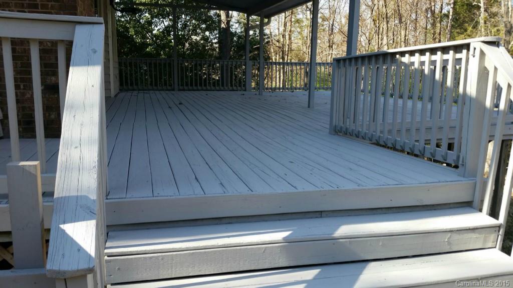 11031 Painted Tree Road Charlotte, NC 28226 - Photo 11 of 15 a view of backyard with wooden floor and outdoor seating